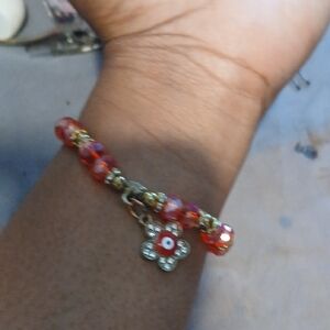 Elegant Red Beaded Bracelet with Flower Charm